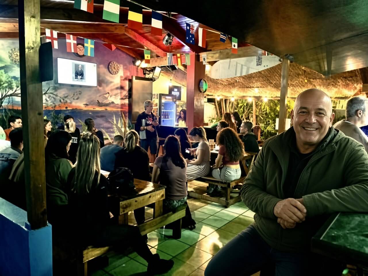 Travelers socializing at Costa Rica Backpackers bar and restaurant